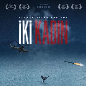 Fotoğraf Parmaklıklar Ardında İki Kadın