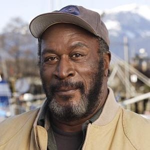 Fotoğraf Men in Trees