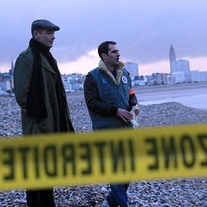 Fotoğraf Deux flics sur les docks