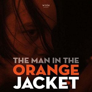 Fotoğraf Turuncu Ceketli Adam