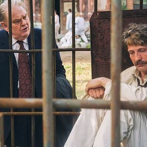 Fotoğraf Men and Chicken