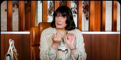 L'Homme au complet marron posteri